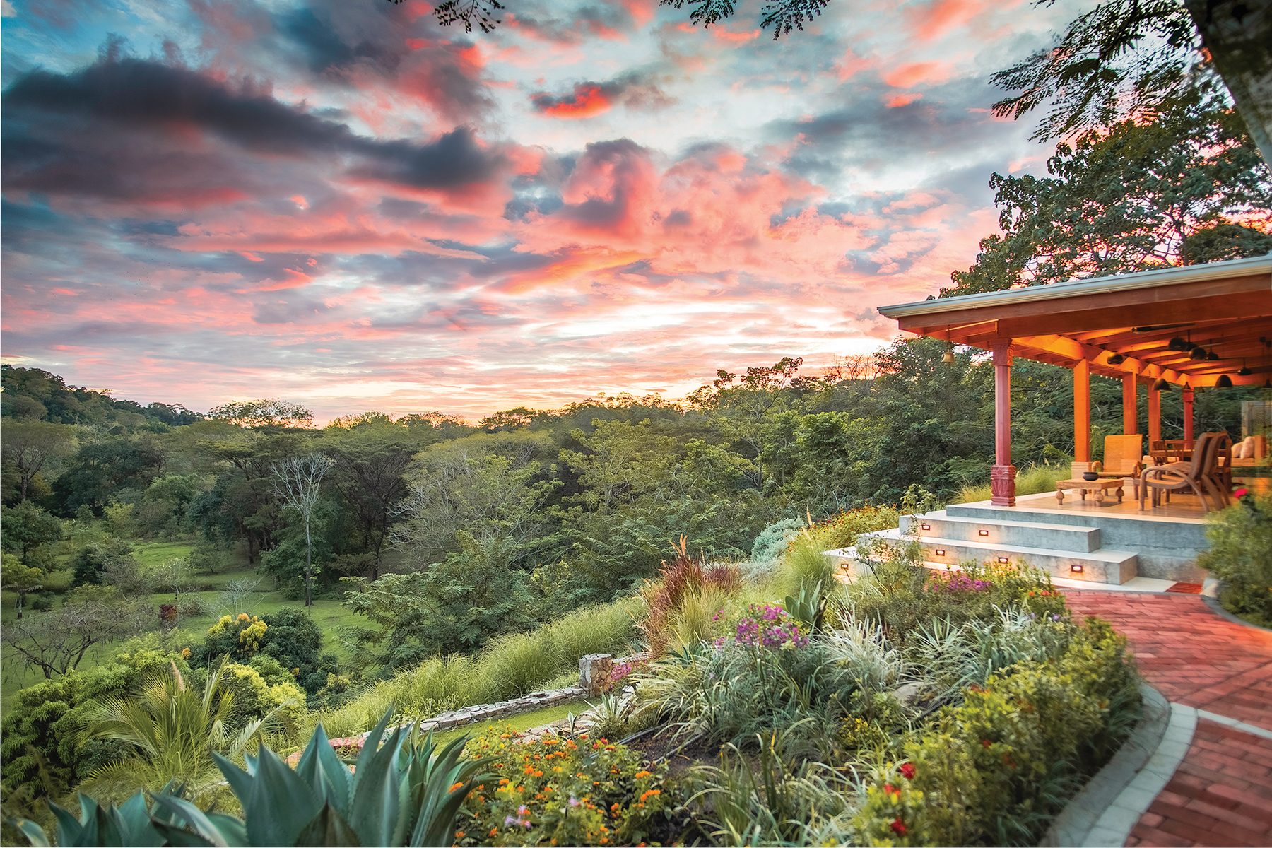 The residence veranda above the gardens at sunset, Nosara, Costa Rica