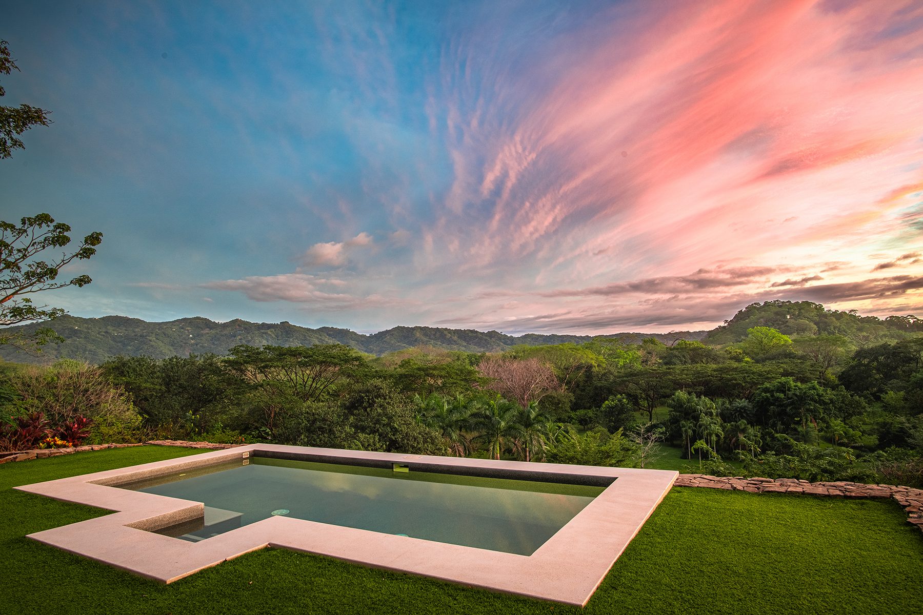 The pool at sunset, facing the mountains