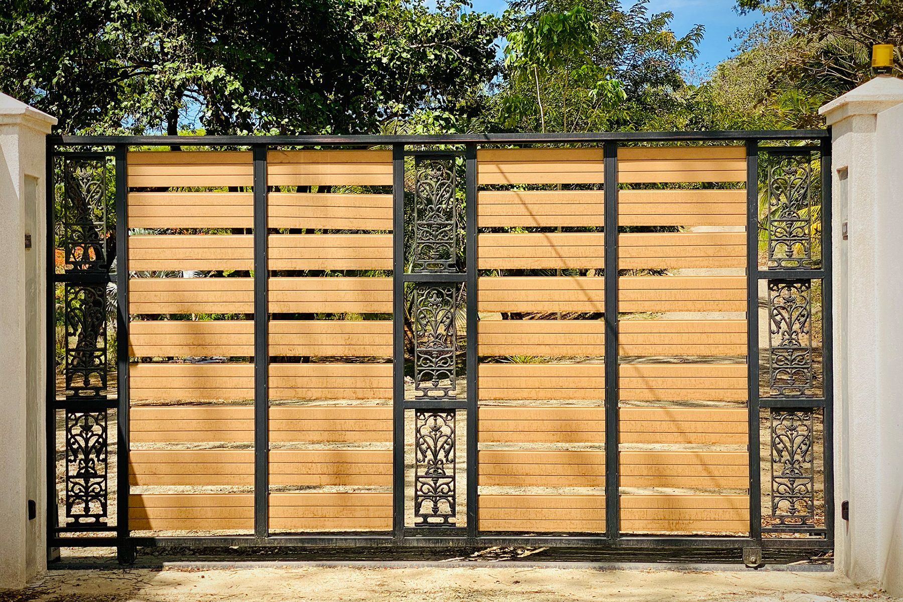 The service gate, one of two entrances to the property