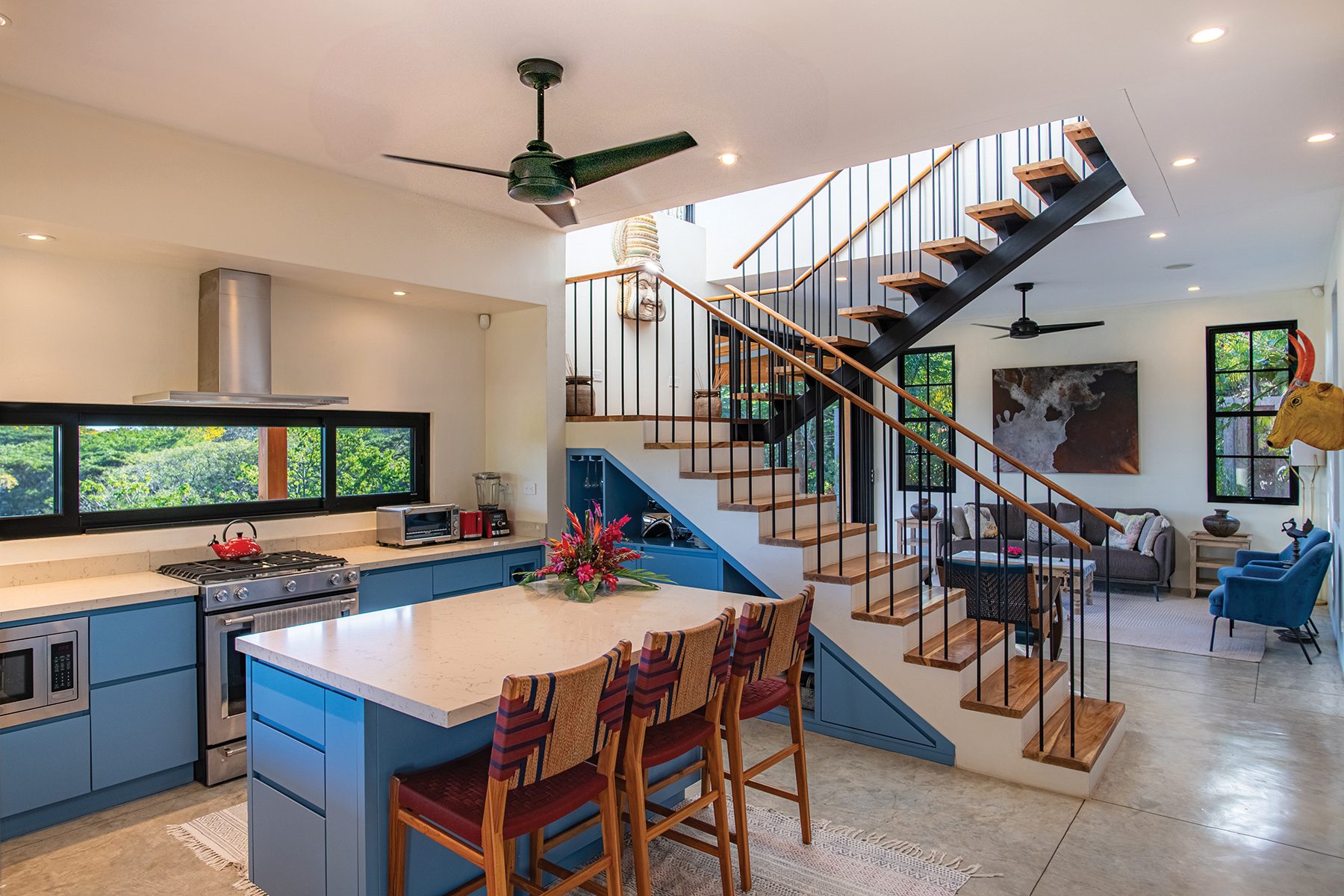 Open plan kitchen and staircase — The Sanctuary Estate, Nosara, Costa Rica