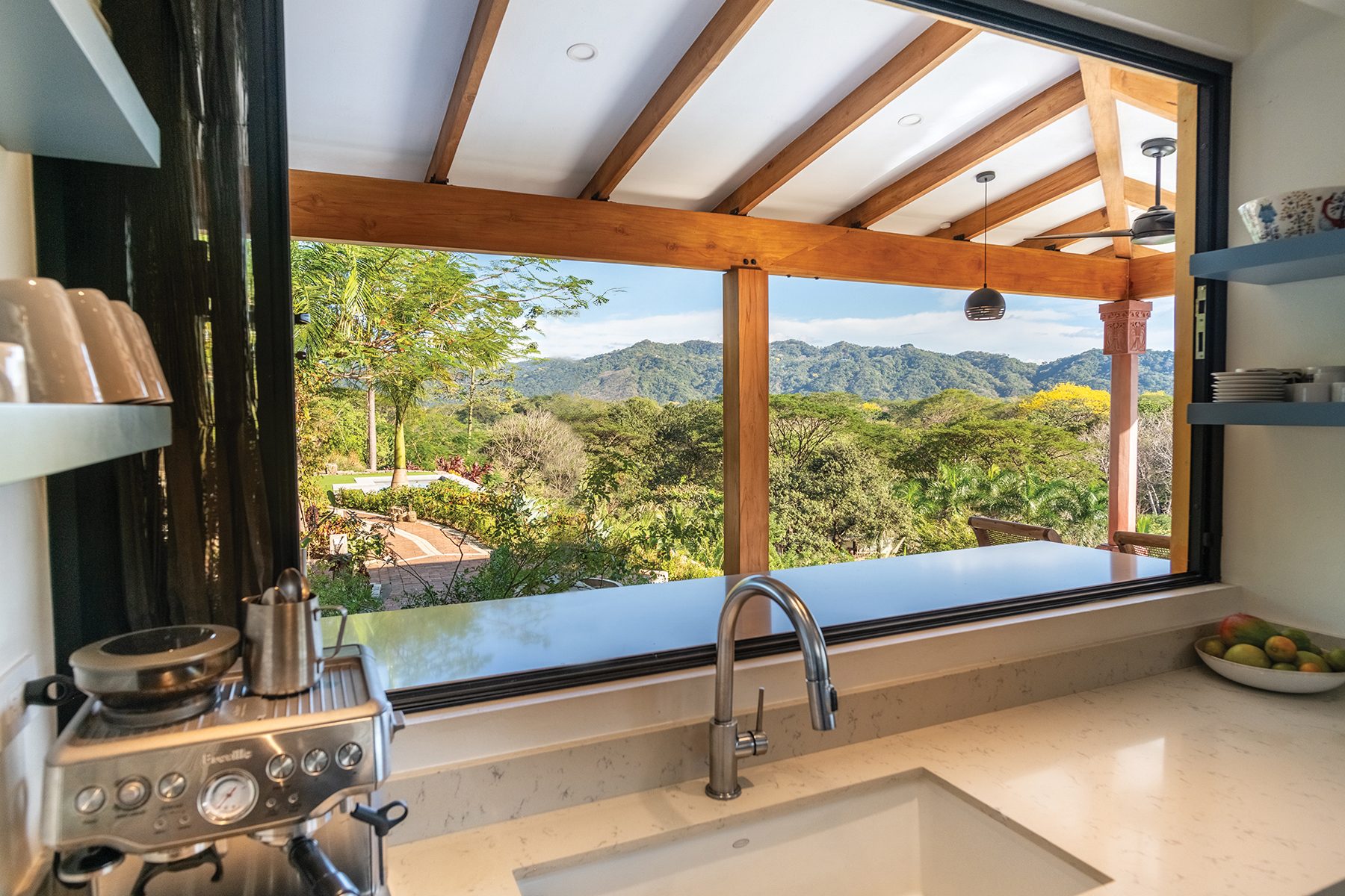 Kitchen window garden view — The Sanctuary Estate, Nosara, Costa Rica