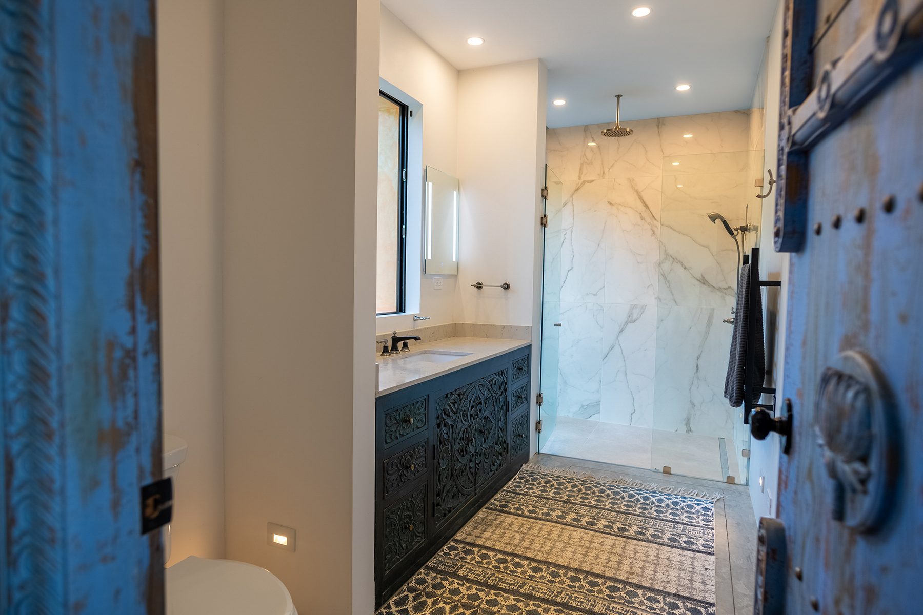 Bathroom marble walk in shower — The Sanctuary Estate, Nosara, Costa Rica