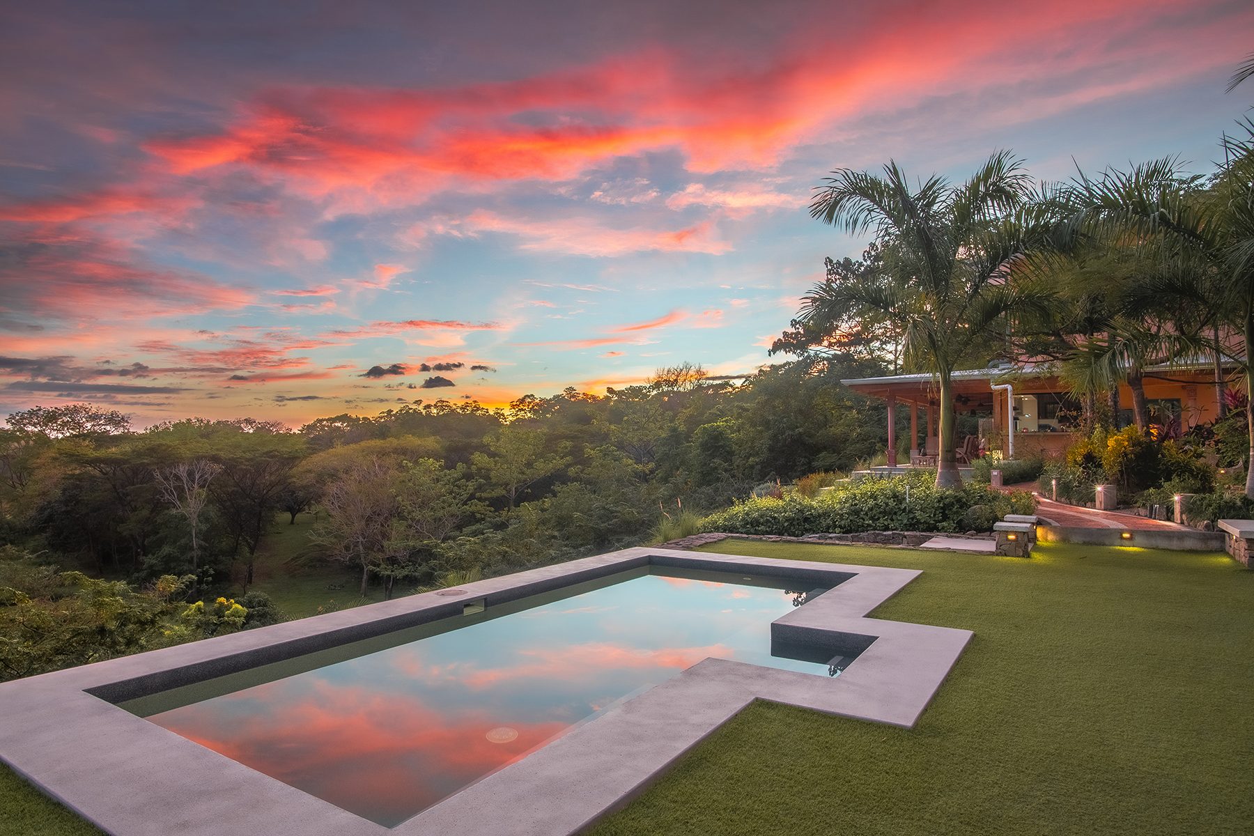 The pool and residence at sunset, The Sanctuary Estate, Nosara, Costa Rica
