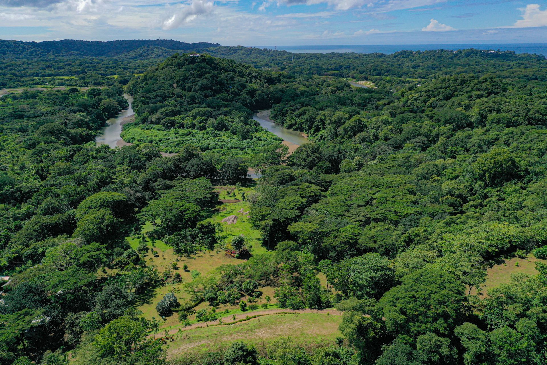 Estate gardens river and ocean aerial — The Sanctuary Estate, Nosara, Costa Rica